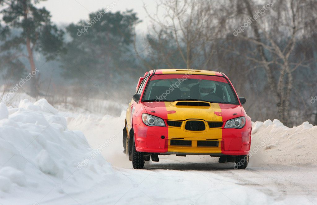 depositphotos_5241439-Rally-red-and-yellow-car-on-snow-track.jpg